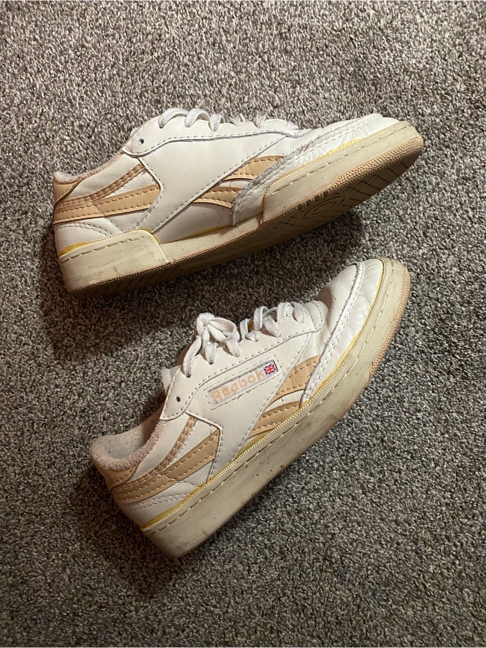 white reebok club c 85 sneakers with peach colored trim